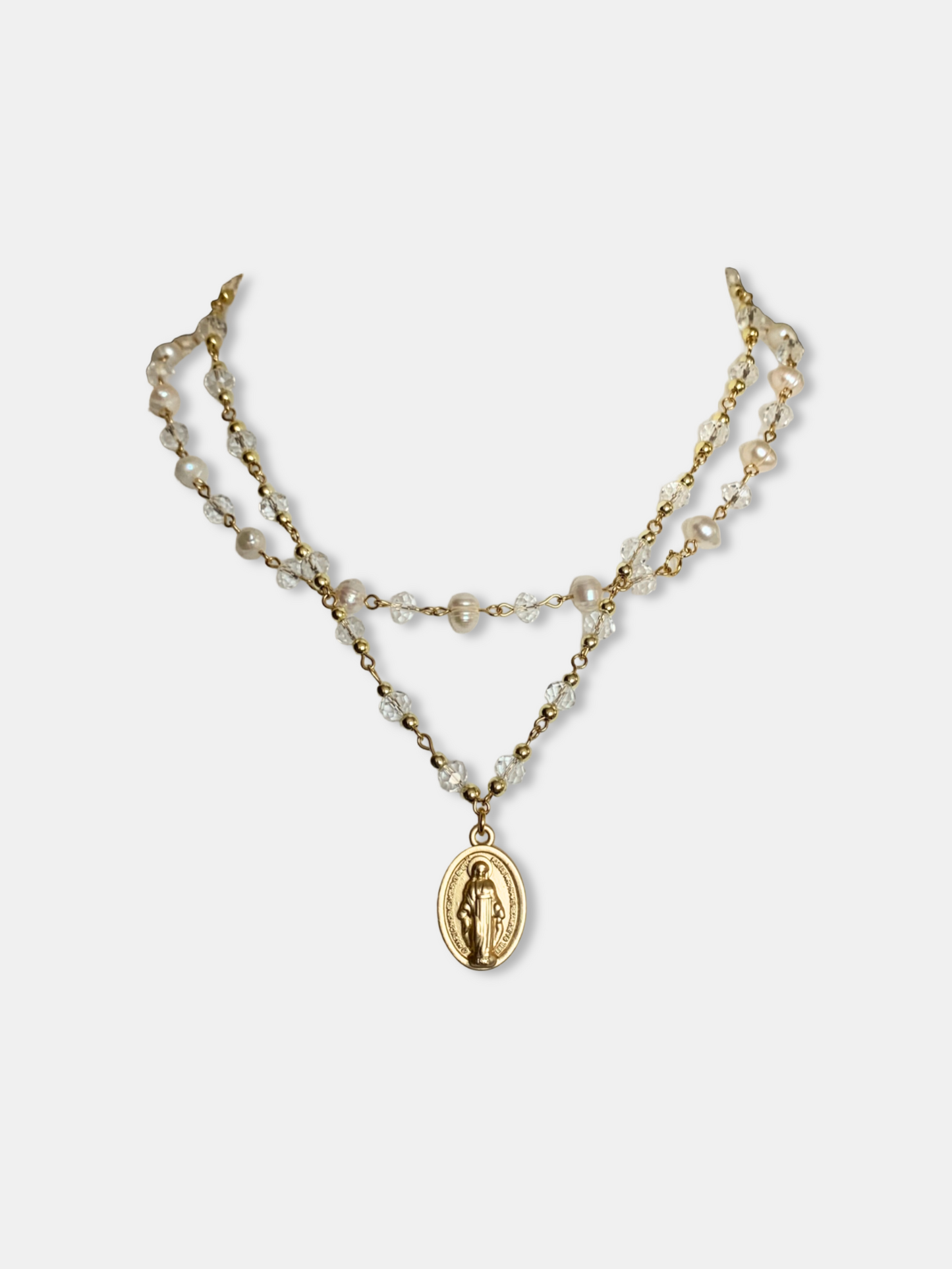 Gothic-Victorian jewelry set with pearl and crystal beadwork and a gold Virgin Mary pendant. Layered necklace with genuine freshwater pearls, crystals.