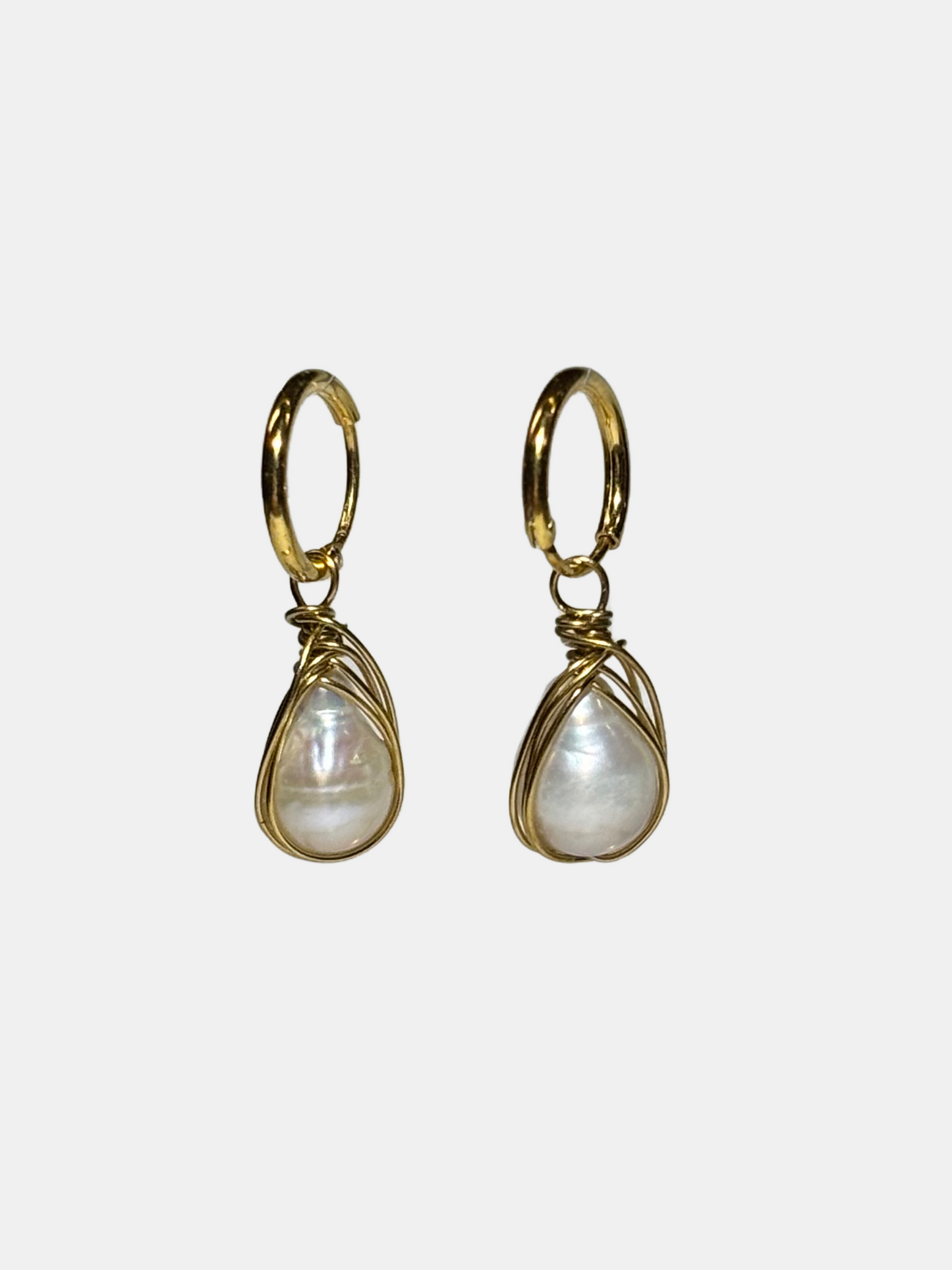Elegant teardrop pearl earrings with a minimalist wire-wrapped gold design, perfect for a timeless look.