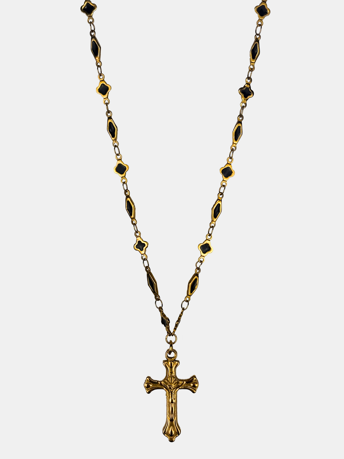 Dramatic and ornate gold cross necklace with a black chain, perfect for lovers of dark academia and romantic goth aesthetics.