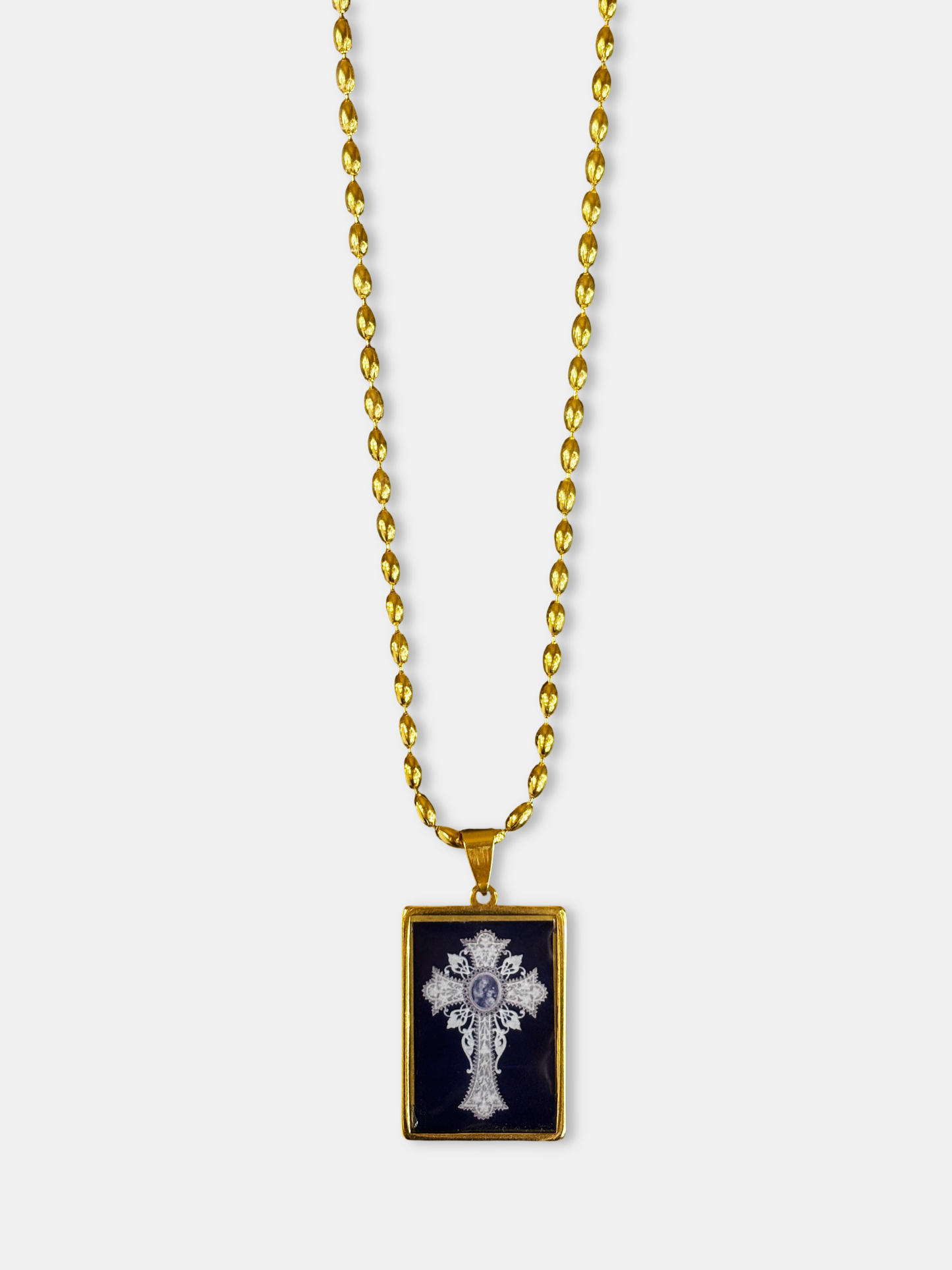 Ornate black and gold necklace from an emerging designer, inspired by sacred art.