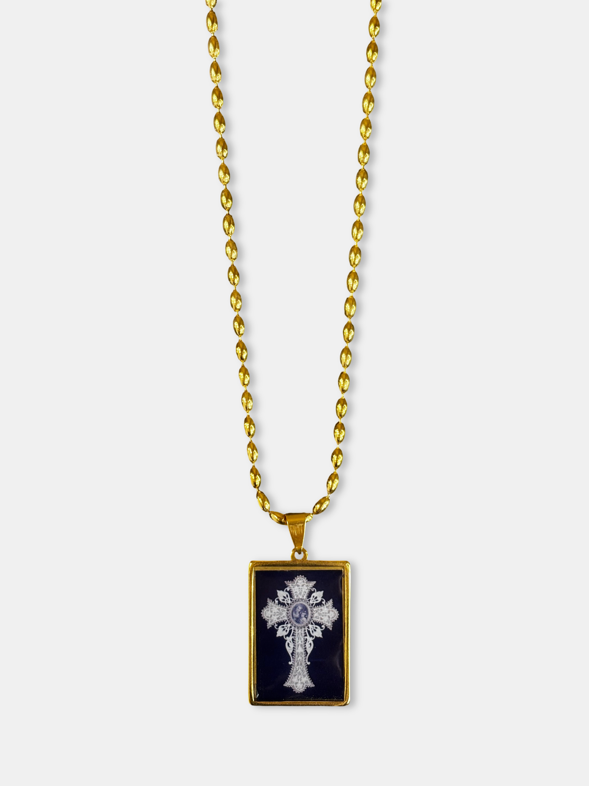 Ornate black and gold necklace from an emerging designer, inspired by sacred art.