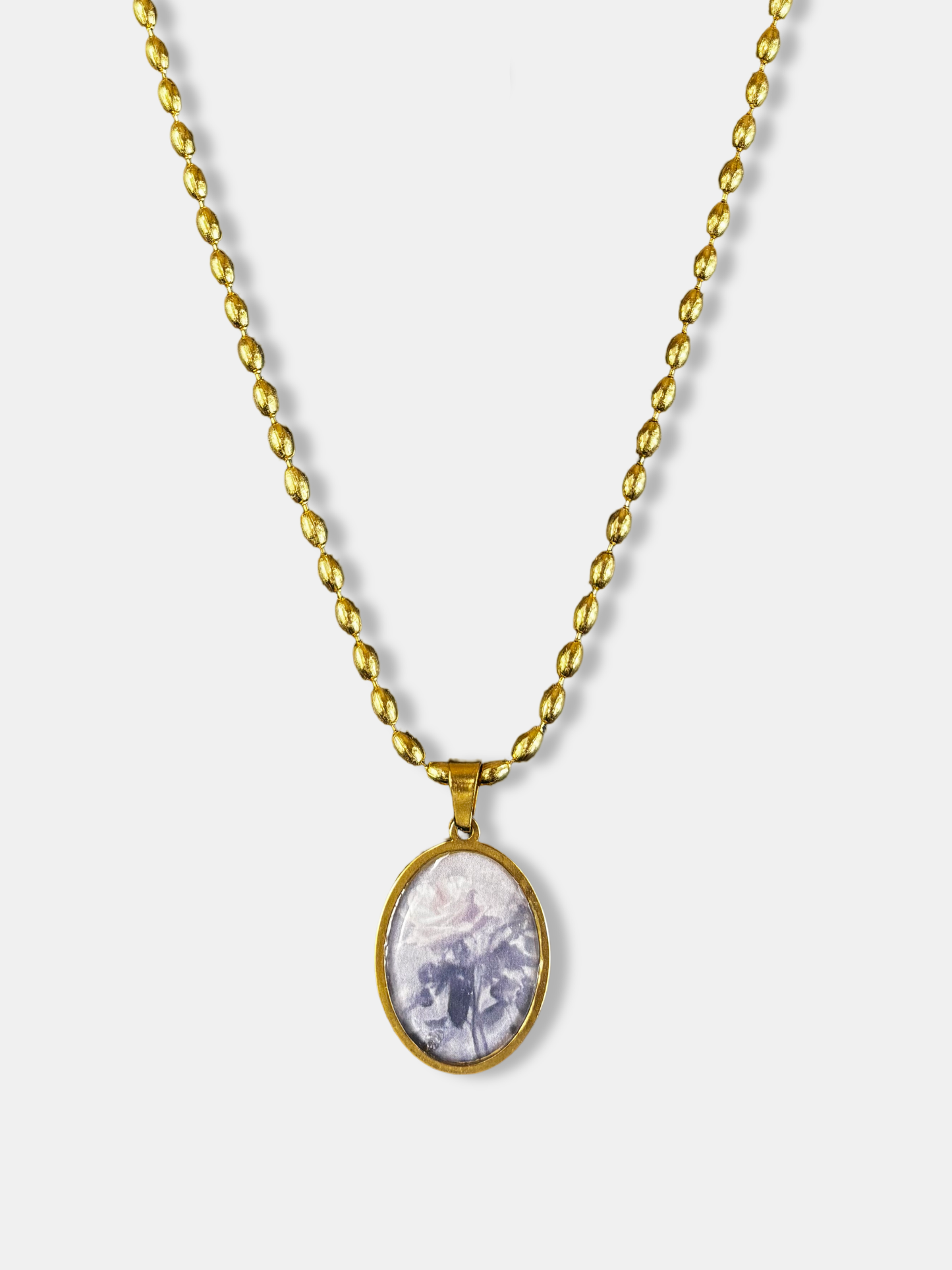 Elegant handcrafted gold necklace with oval rose pendant by Oro Momentum Jewellery.