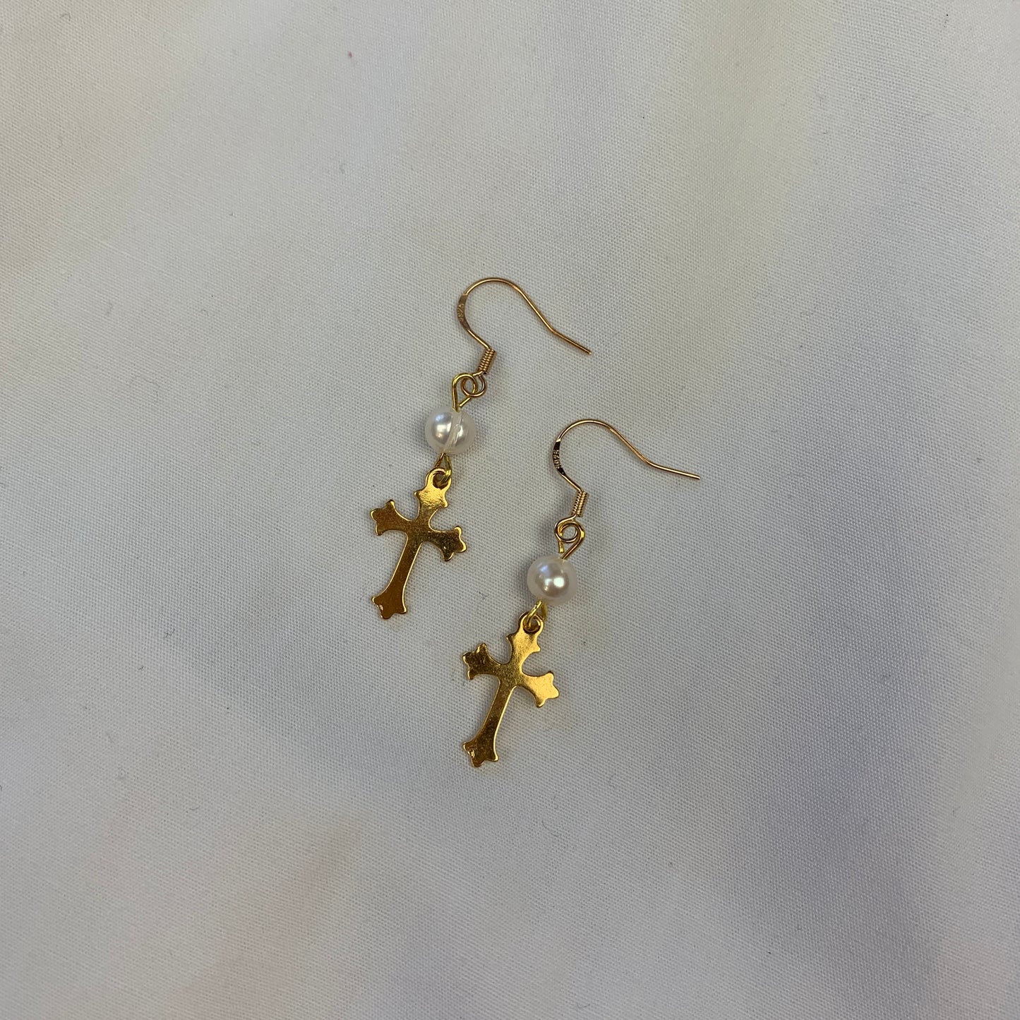 Gothic baroque pearl cross earrings in gold, a unique alternative to Vivienne Westwood-inspired jewelry.