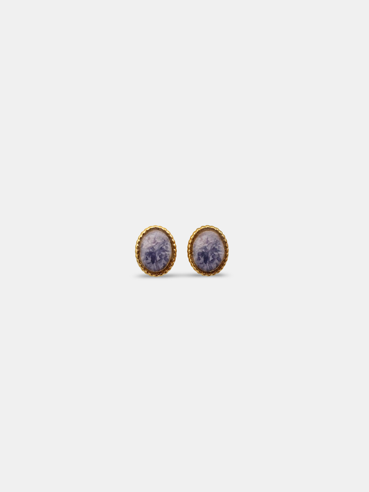 Gold oval stud earrings featuring a hand-painted rose cabochon.